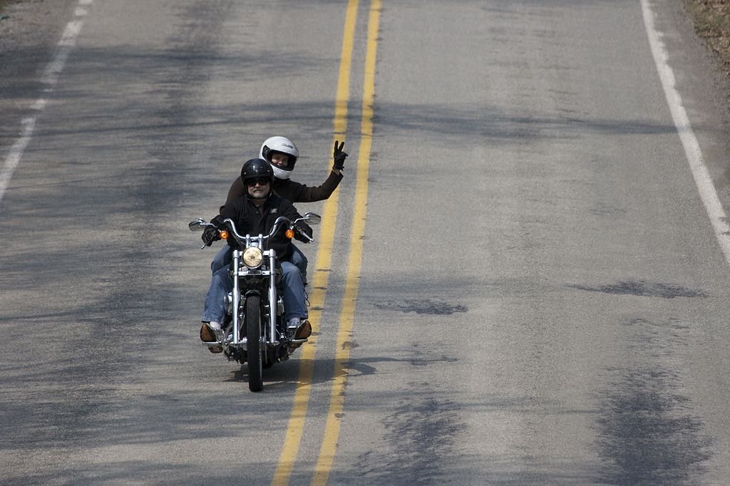 motorcycle wave with pillion