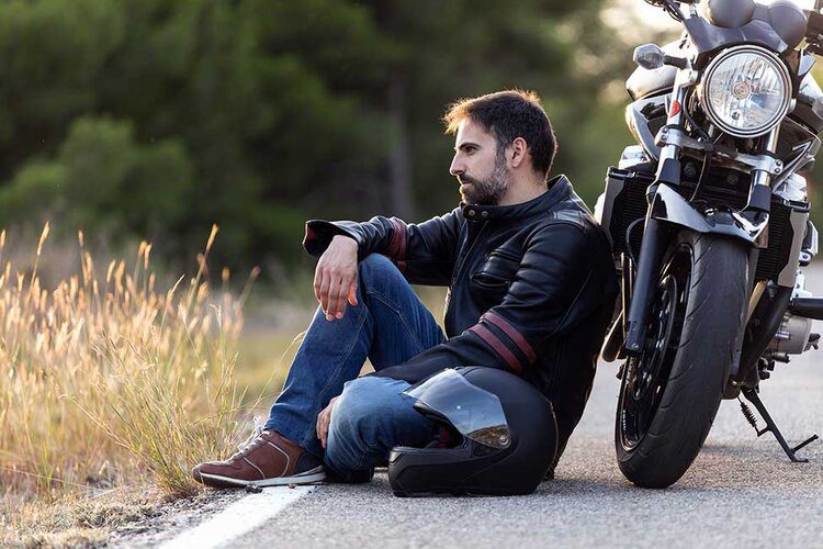 motorcyclist broken down