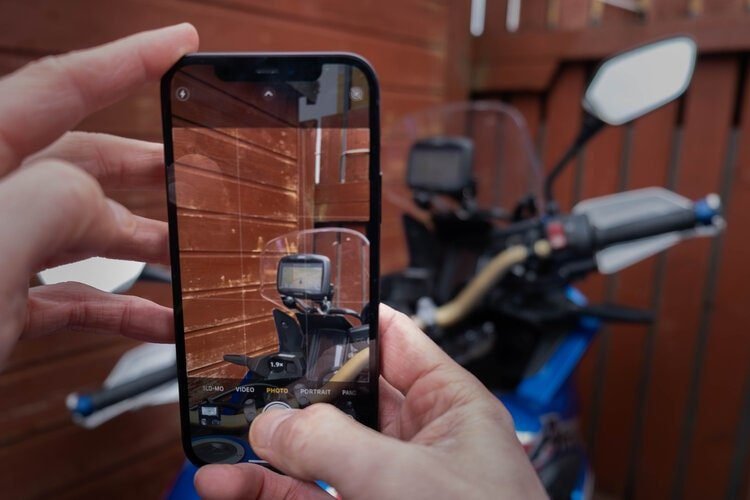 shooting bike with iphone 12 and garmin motorcycle sat-nav