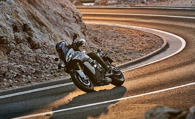 bmw s1000xr twisty road at sunset