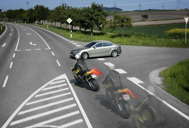 car pulling out on motorcycle