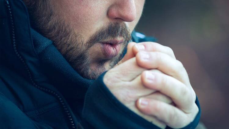 blowing-into-cold-hands