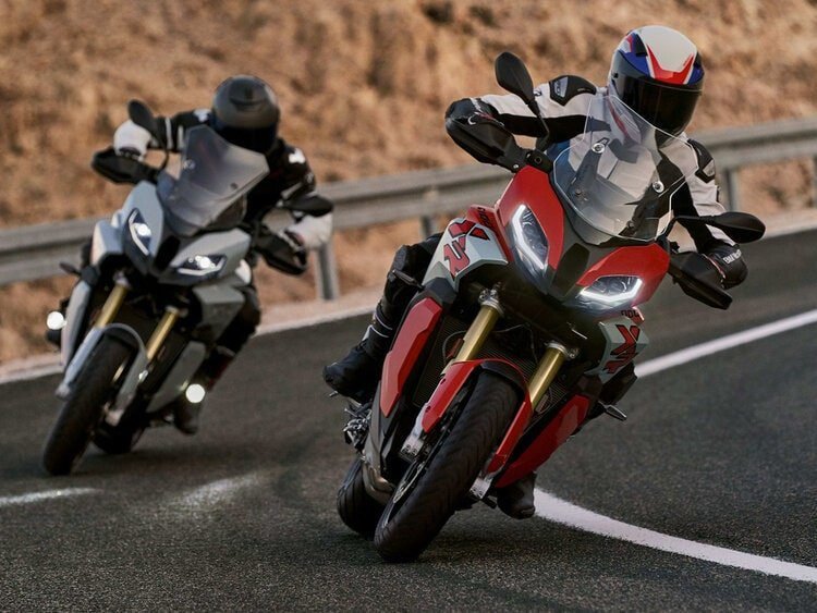 two bmw s1000xr's on mountain road
