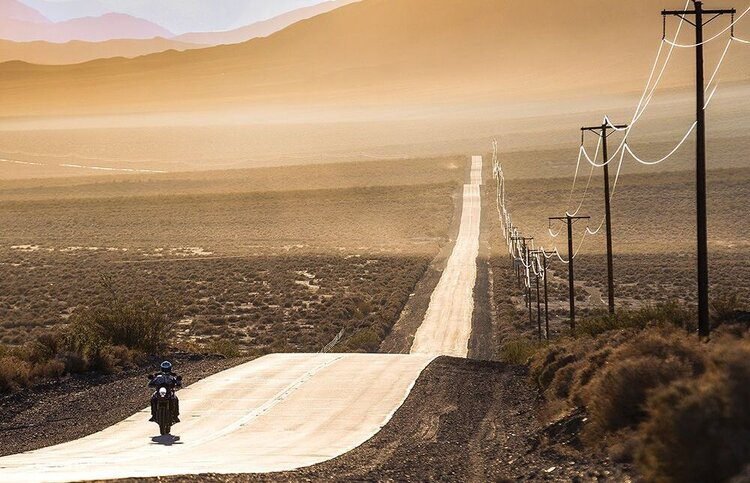 long straight road - listening to music while riding a motorcycle