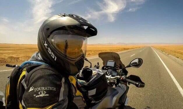 long straight road - listening to music while riding a motorcycle