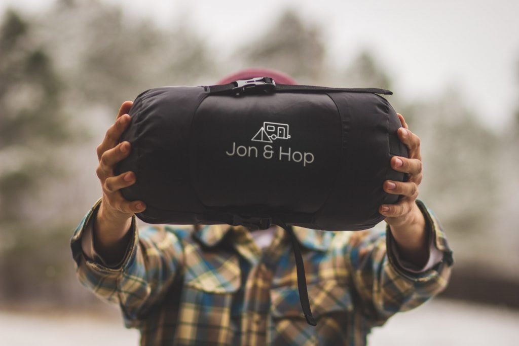down vs synthetic - motorcycle camping sleeping bag