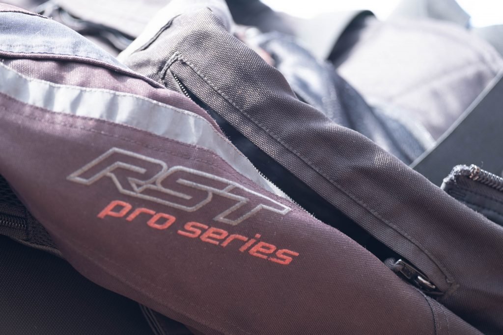 motorbike pants stitching and logo