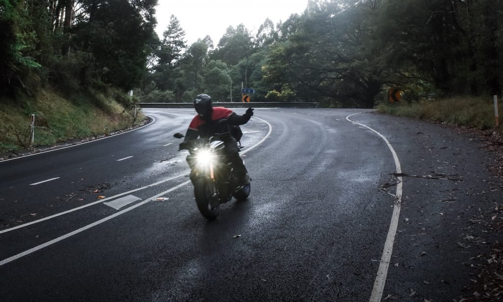motorcyclist waving