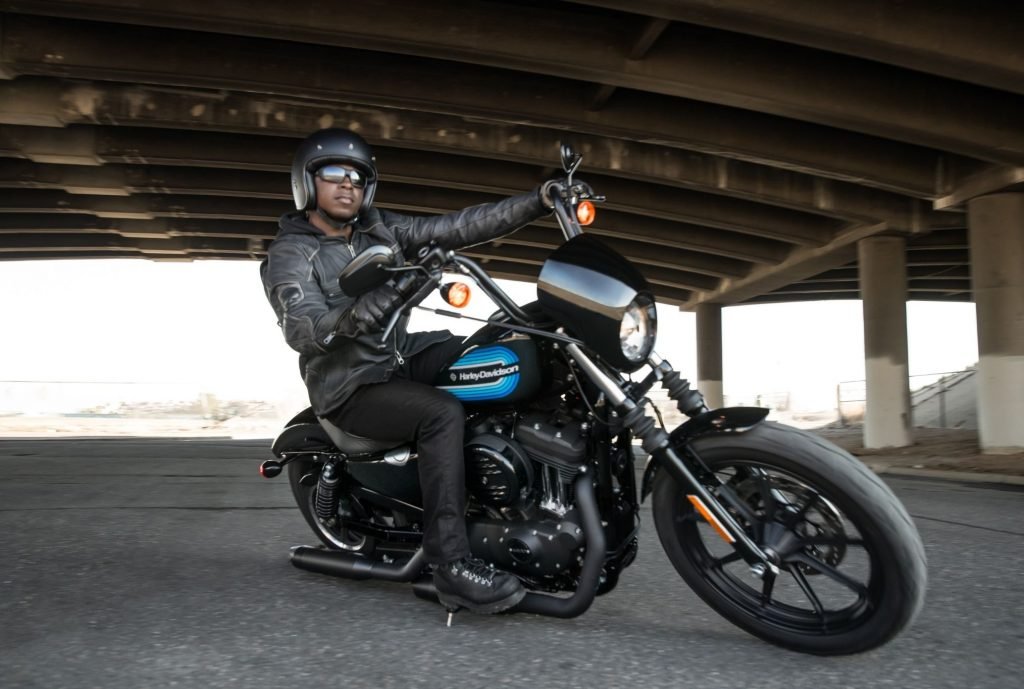 rider on harley-davidson under tunnel