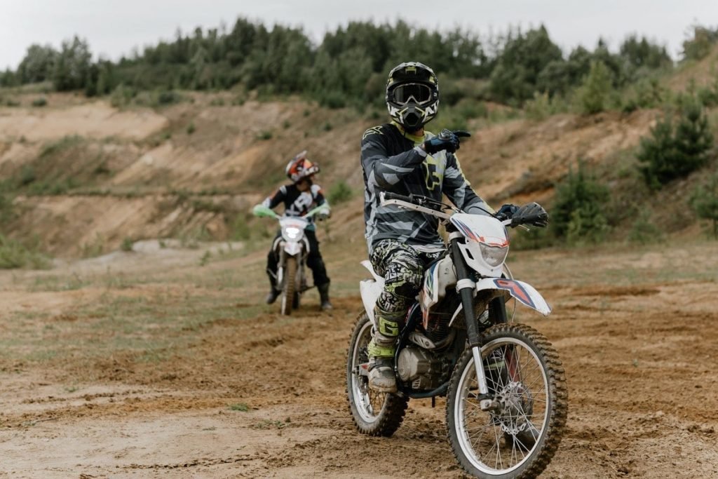 two bikers off-road - motorcycle touring trends