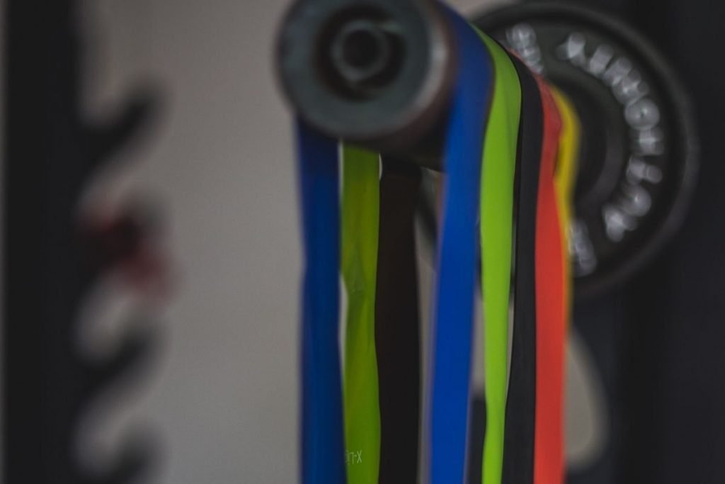 stay fit on your motorcycle tour - resistance bands hanging off barbell