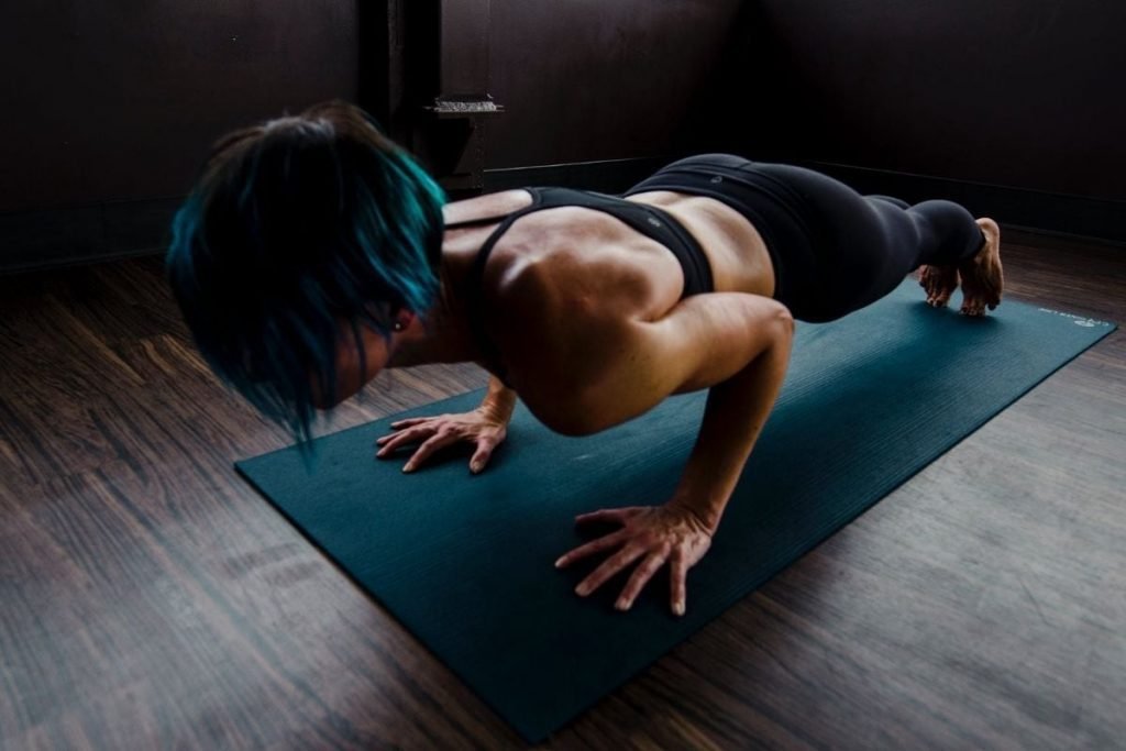 women practicing yoga