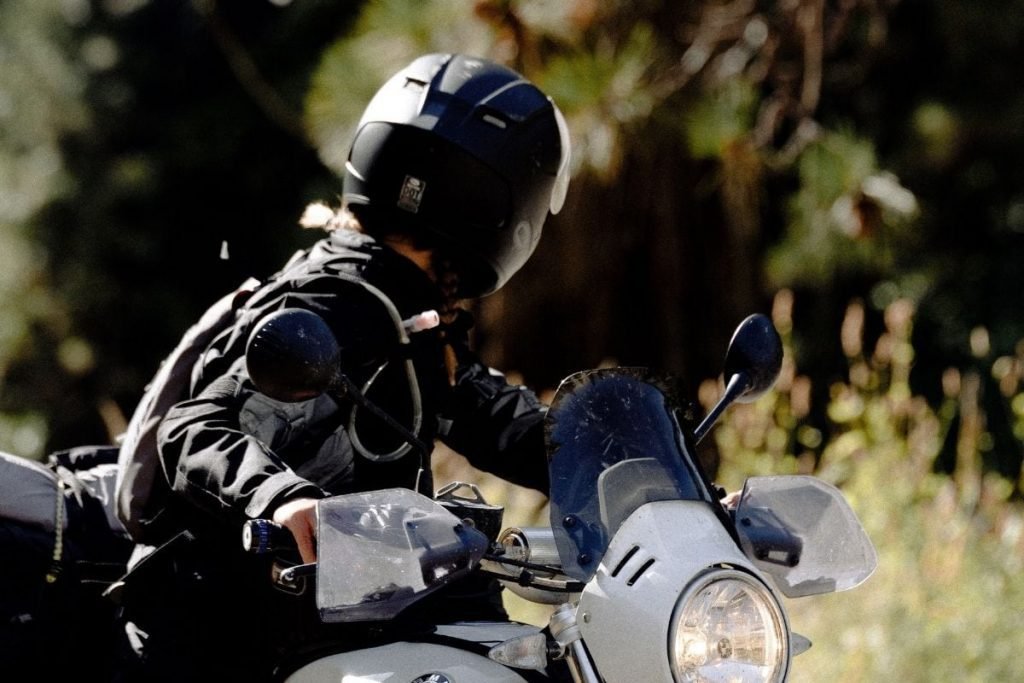 bikers doing shoulder check on bmw