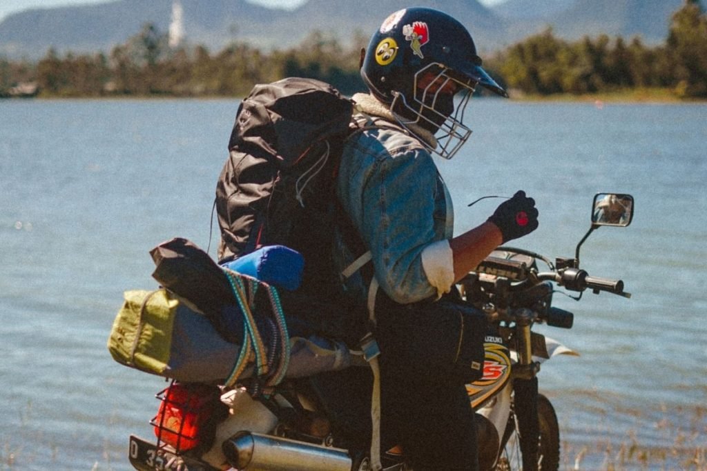 rider wearing backpack - motorcycle touring accessories