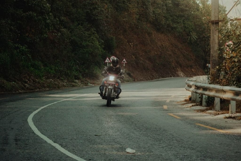 motorcyclist riding through bend