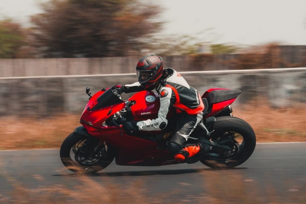 rider on red ducati sportsbike