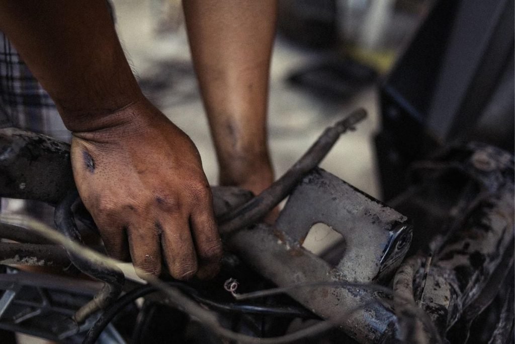 mechanic fixing bike