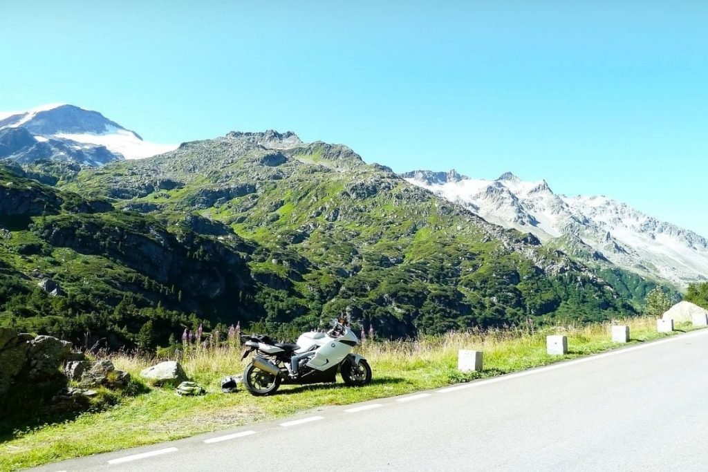 bmw side of road by mountains