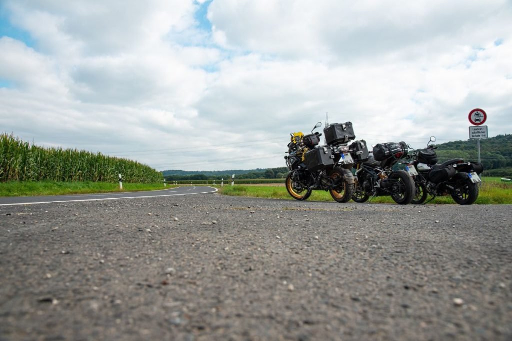 adventure motorbikes in countryside - touring motorcycles for short riders