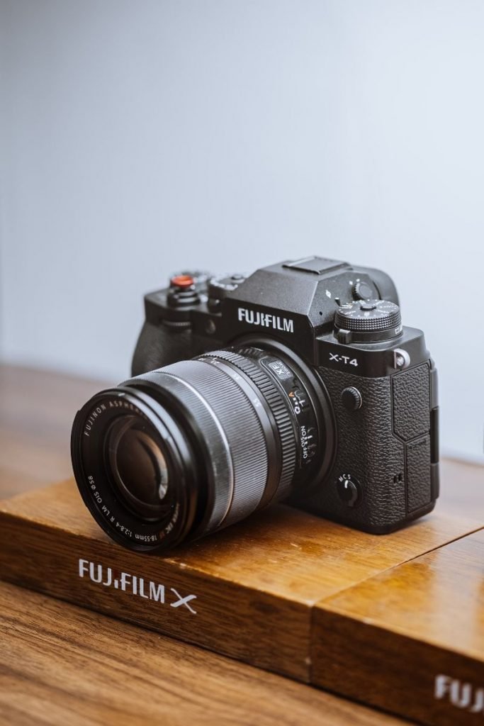 fuji x-t4 on wooden fuji plinth - best camera setup motorcycle travel
