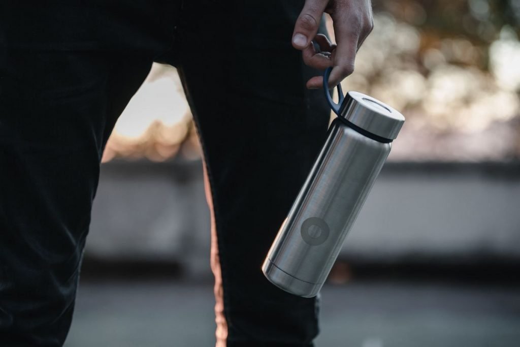 guy carrying water flask