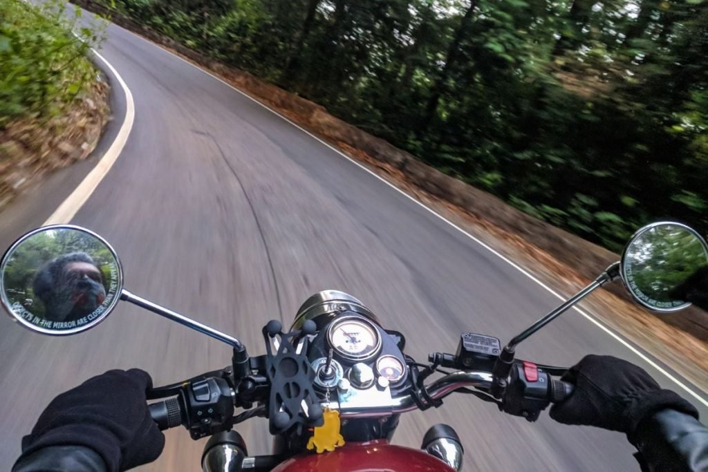 rider on country road - second-hand bike for touring
