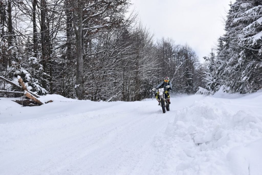 rider off-road on snowy surface