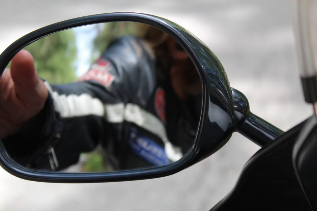 rider checking mirror