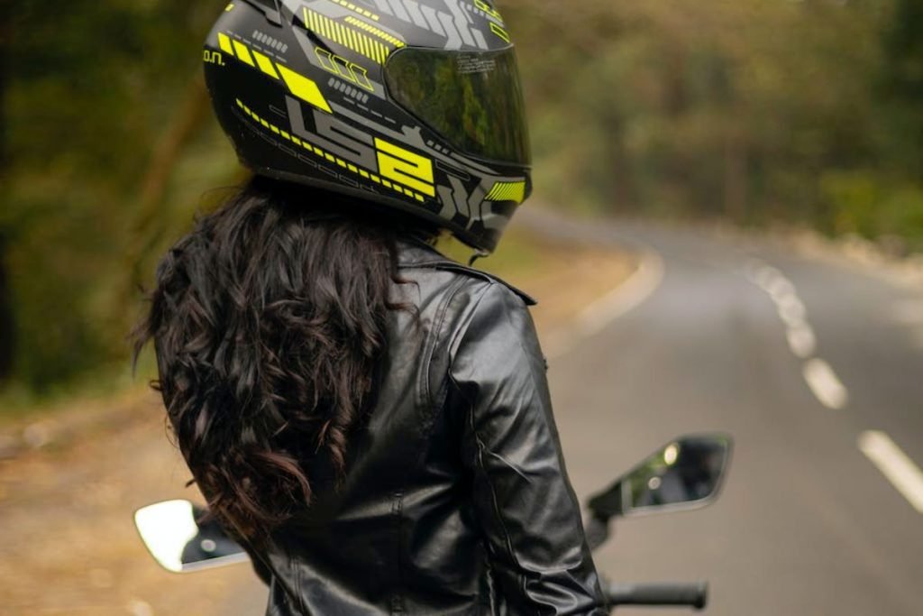 motorcycle route planner europe - woman rider in helmet